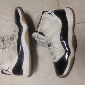 Jordan Retro 11 White and Black High-Top Sneakers